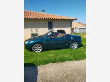 MG