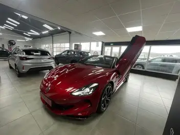 MG