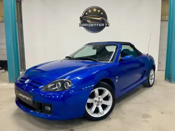 MG
