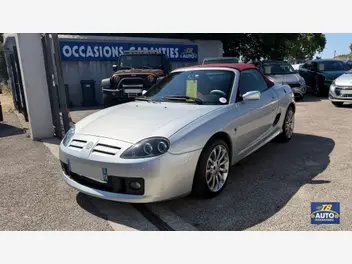 MG