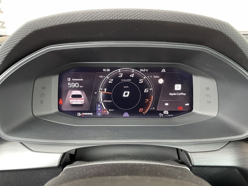 Cupra Leon Sportstourer en virage sur route de montagne